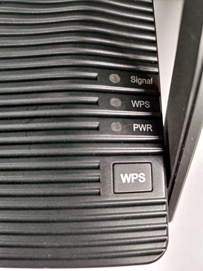 Vue rapprochée du bouton WPS ainsi que des voyants WPS, d'alimentation et de signal